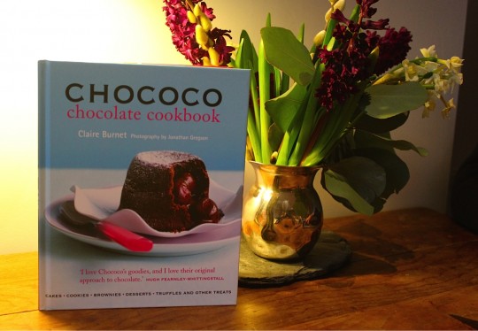 Chococo book next to flowers